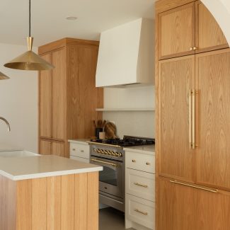 Farmhouse Kitchen with wood cabinets from Ateliers Jacob