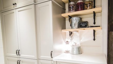 A spacious and organized interior with storage cabinets and shelves.