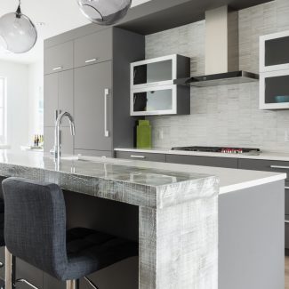 Contemporary Kitchen with central island and built-in cupboards.