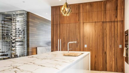 Modern Kitchen with central island and built-in cabinets.