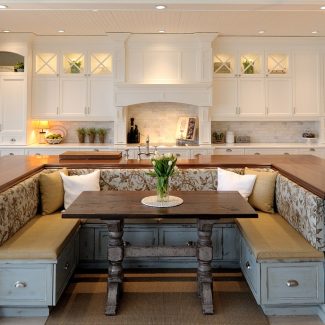 Elegant rustic kitchen layout with built-in cabinets and central island.