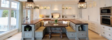 Elegant rustic kitchen layout with built-in cabinets and central island.