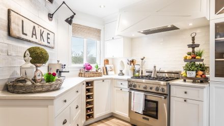 Charming rustic kitchen with central island and light-colored worktop.