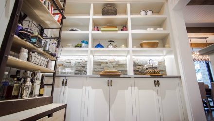 Designer kitchen with functional integrated storage.