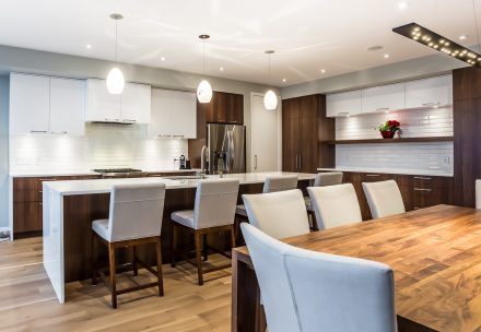 Modern Kitchen with spacious central island and light-colored countertop.