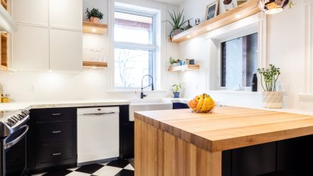 Modern white Kitchen with bold accents created by Ateliers Jacob for Geneviève Everell.