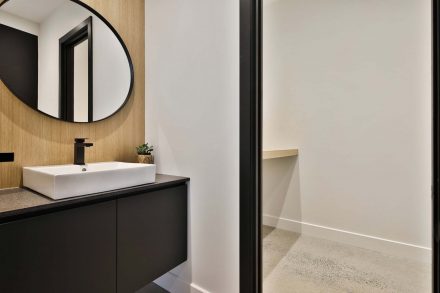 Dark modern bathroom furniture.