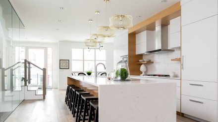 Modern Kitchen with central island and integrated appliances.