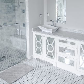 Under sink storage furniture in a classic bathroom.