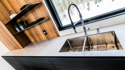 Modern urban-style kitchen with integrated storage.