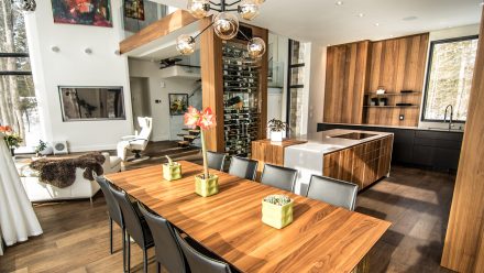 Modern kitchen with an urban style featuring a white stone countertop.