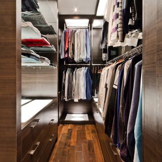 Spacious room layout with custom-made wardrobe.