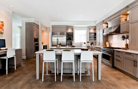 Dark Kitchen with elegant countertop in contemporary house.