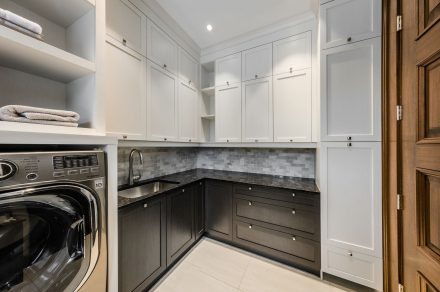 Modern laundry room with spacious work surface.