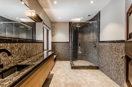 Modern bathroom with concealed handles.