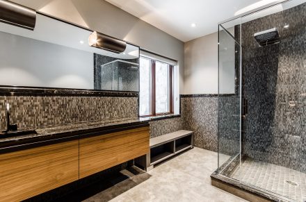 Modern bathroom with concealed handles.