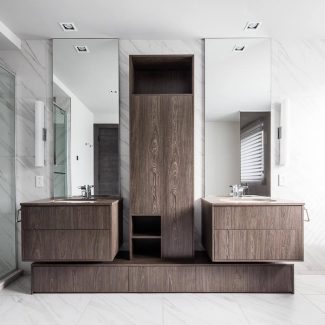 Bathroom with dark cabinets.