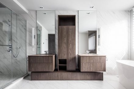 Bathroom with dark cabinets.