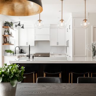 Contemporary kitchen furniture with a dark central island.