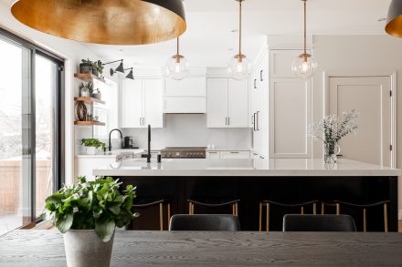 Contemporary kitchen furniture with a dark central island.