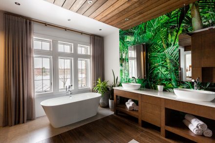 Bright bathroom with separate bathtub.