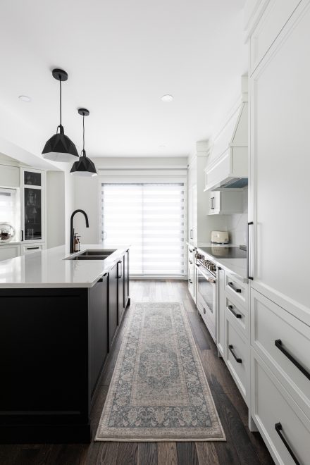 Superb modern kitchen with central island and spacious counters.