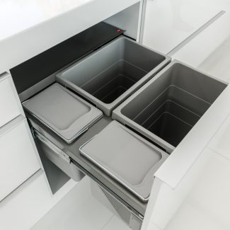 Solution: Recycling bins and trash can for selective sorting in the kitchen.