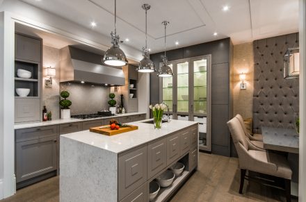 White furniture with LED lighting for a modern kitchen.