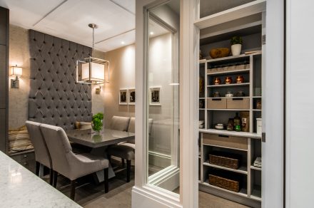 Kitchen with custom-made furniture and integrated lighting.