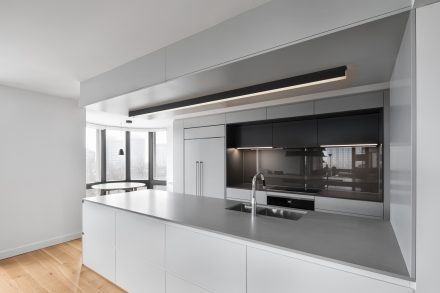 Elegant white and gray kitchen work space.