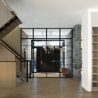 Le Boisé Residence - a modern and elegant kitchen with high-end cabinets.