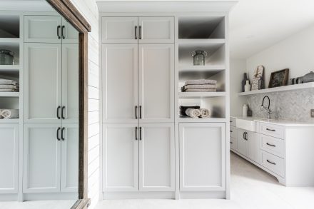 Design of custom furniture with white cabinets.