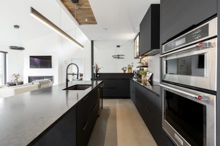 Modern Kitchen with central island and integrated lighting.