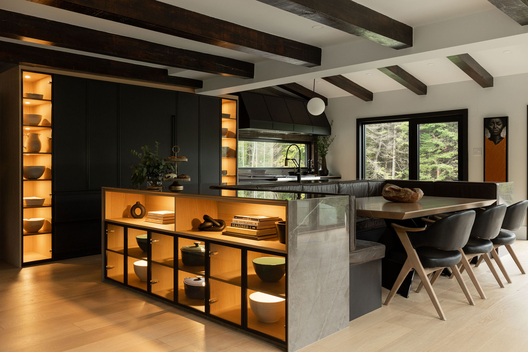 Modern kitchen with central island in spacious house.