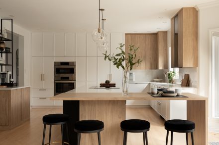 Airy kitchen with island and plenty of workspace.