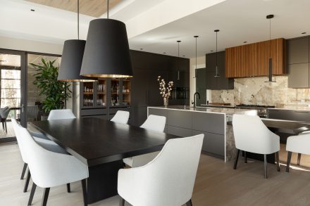 Stunning kitchen with plenty of integrated storage and luxurious countertops.