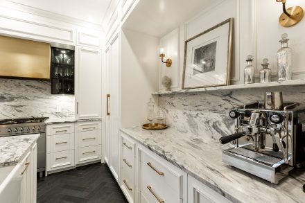 High-end white kitchen cabinets by Ateliers Jacob.