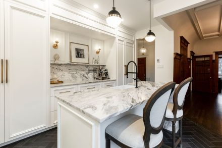 Parisian-inspired white kitchen by Ateliers Jacob.